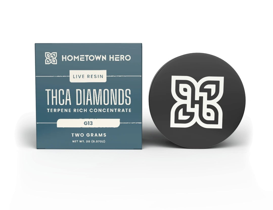 Hometown Hero 2g G13 indica live resin THCA diamonds hemp concentrate, clear crystalline form with a golden hue.