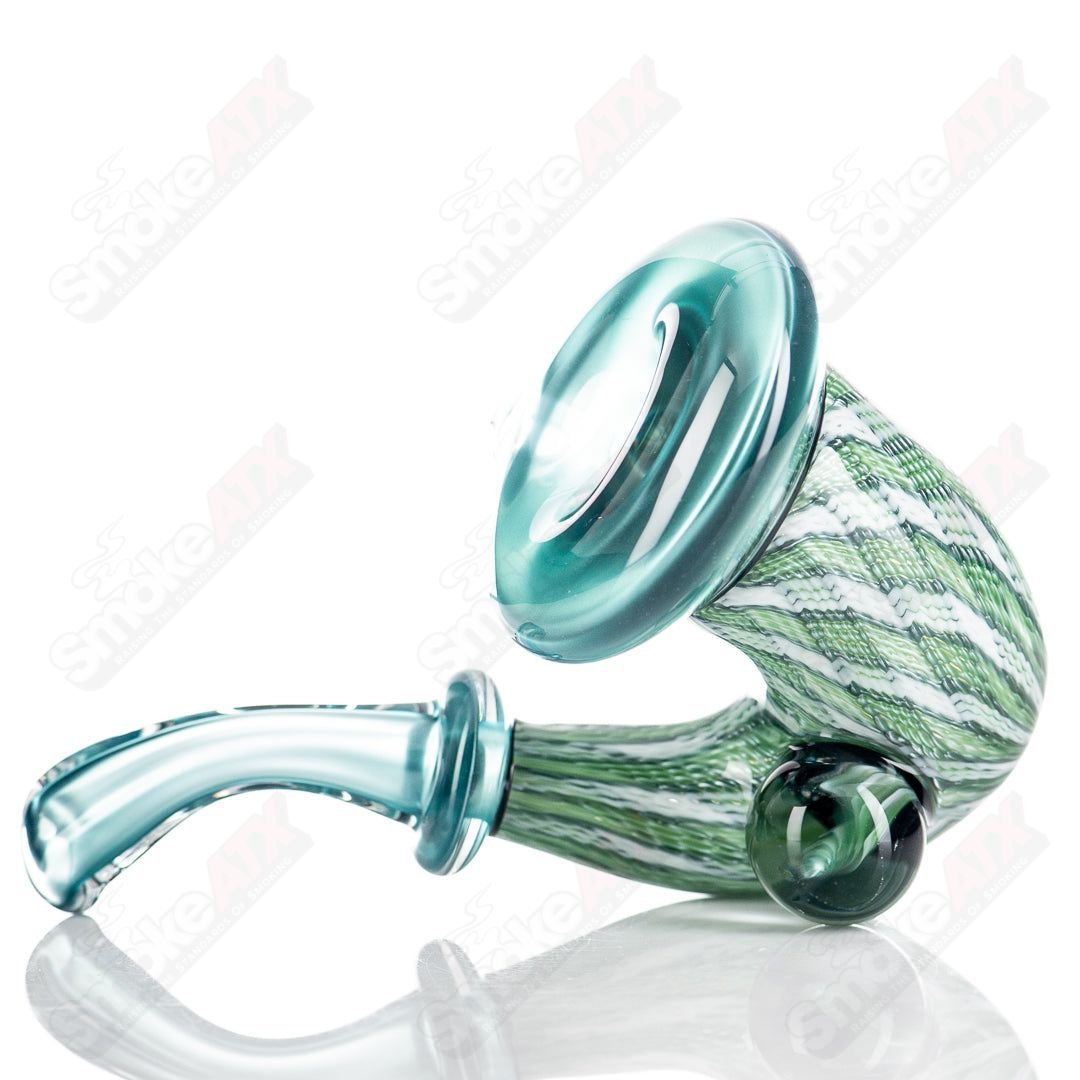 Neptunium Sherlock glass by JMass, featuring a detailed Sherlock-style design with transparent glass and intricate artwork.