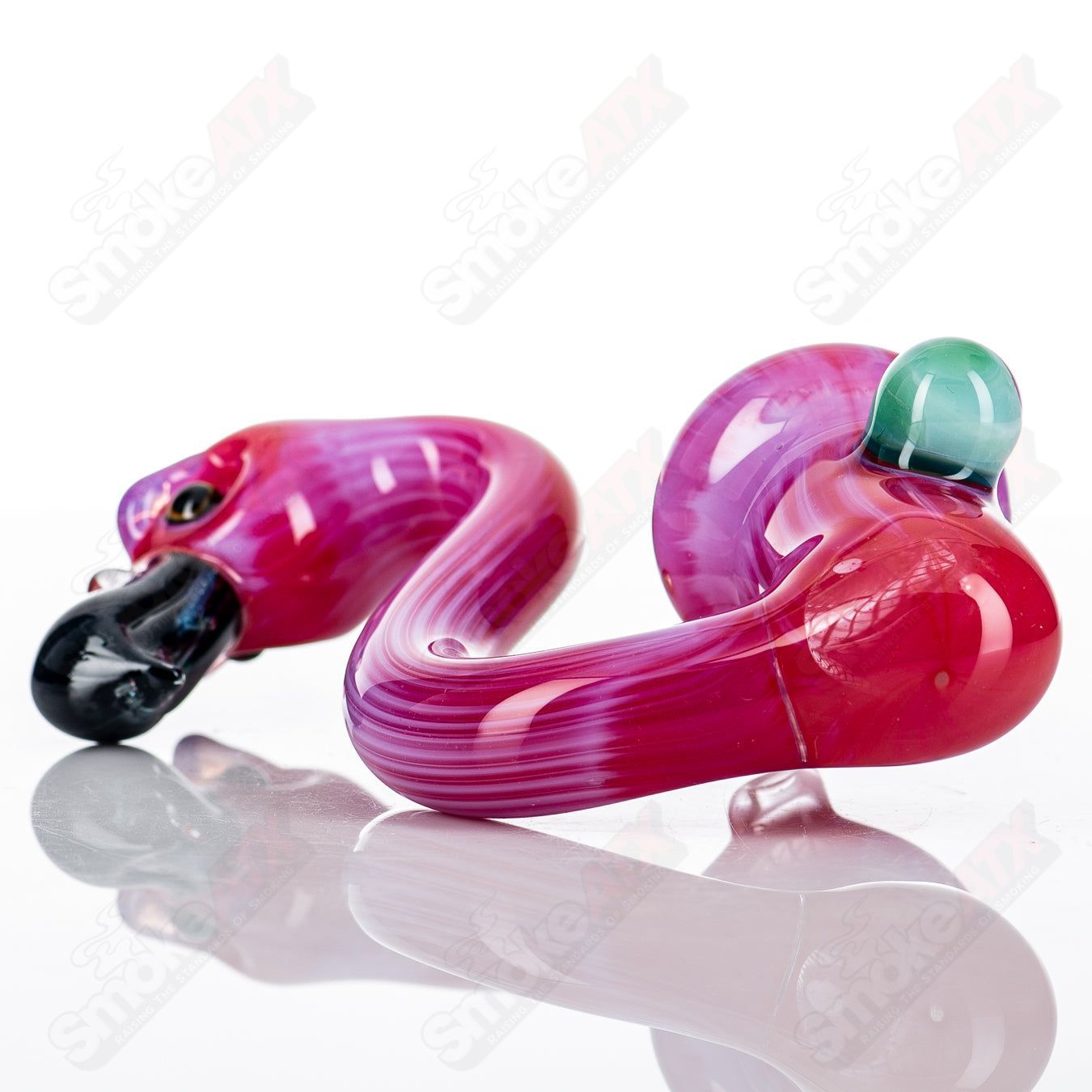 Flamingo Sherlock Burtoni Glass, colorful heady glass pipe with a unique flamingo design and curved neck for easy use.