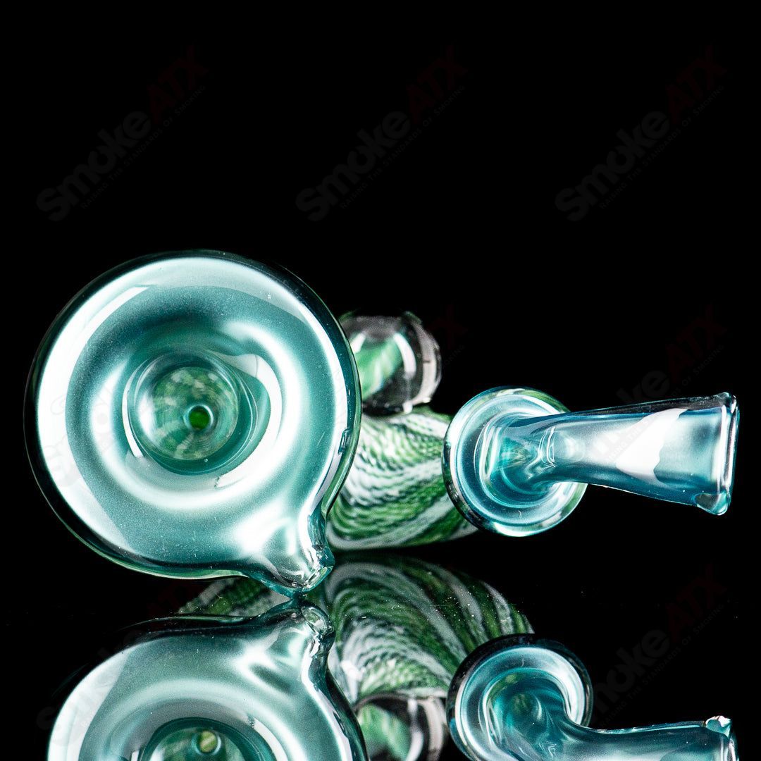 Neptunium Sherlock glass pipe by JMass, featuring a detailed Sherlock Holmes-inspired design for smoking accessories.