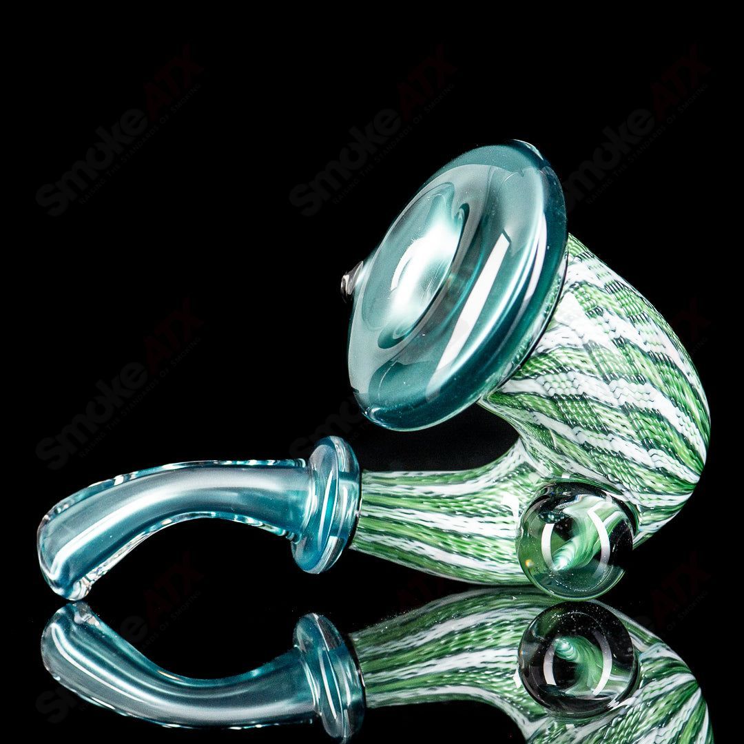Glass Sherlock pipe from the Neptunium Sherlock Collab by Smitty & JMass, featuring a clear glass design with intricate details.